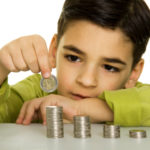 Boy with coins